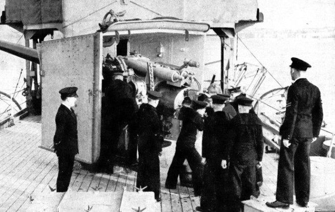 A party of RNVR men from H.M.S. President at gun drill on board H.M.S. Curacoa