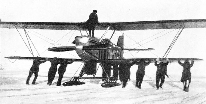 AN ARCTIC AEROPLANE is specially fitted with skis for landing on the ice and snow.