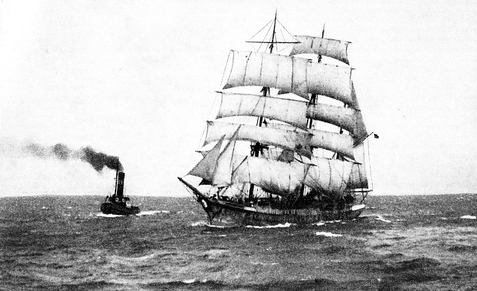 The barque Lingard being towed by a tug