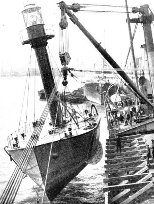 The Belmoira off Woolwich lifting on board a complete lightship